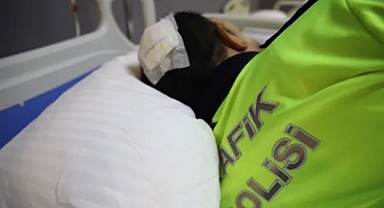 ’Dur’ ihtarına uymayan lüks araç trafik polisine çarpıp kaçtı